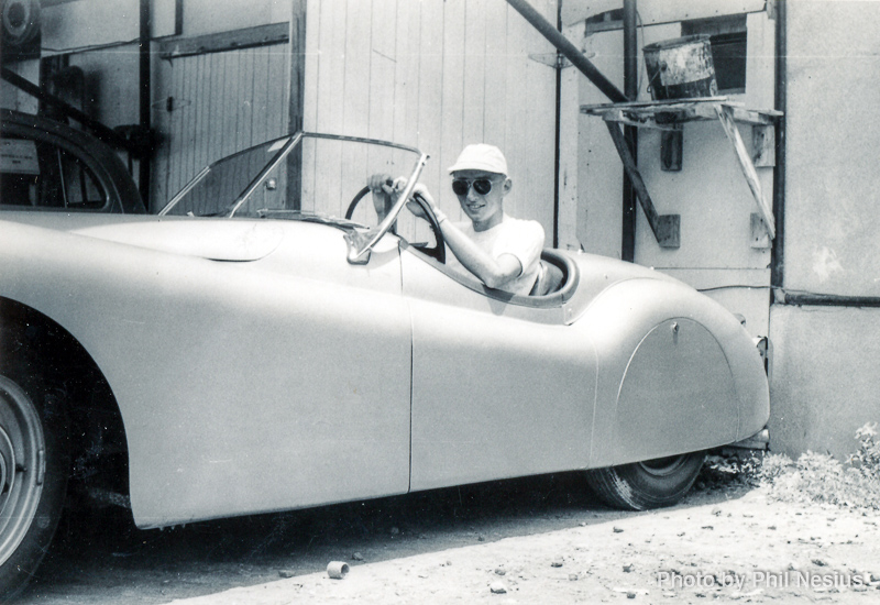 Dad sitting in a Jaguar / 137E_0038 / 