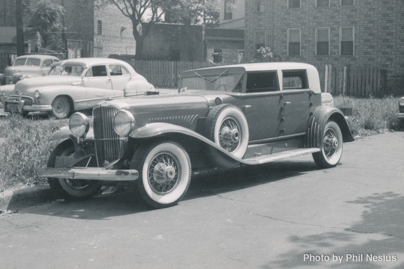 Duesenburg on street, might be 1952 in Texas / 137E_0039 / 