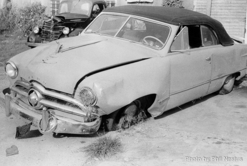May be a wrecked car they parked outside of base to scare people. / 137E_0044 / 