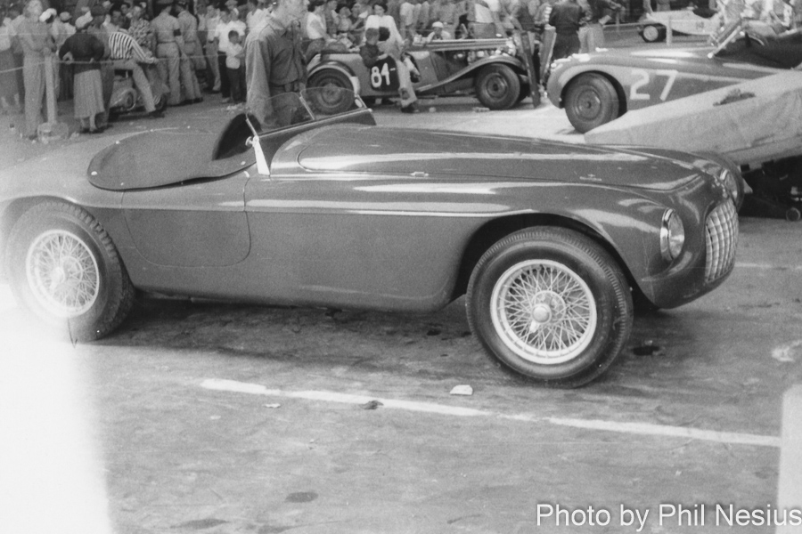 Ferrari 166 MM Touring Spider with tonua cover driven by James Simpson Was running #90 but picture doesn't have a number on it yet at Chanute AFB June, 1953 / 312K_0005 / 