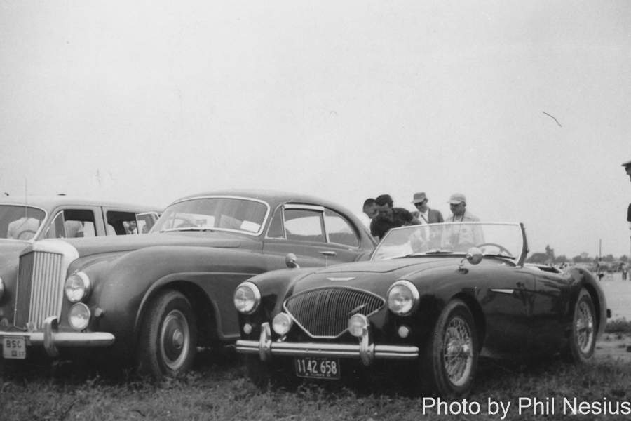 Dads Austin Healey 100/4 parked next to Briggs Cunningham Bentley Continental BC4A at Lockbourne AFB August 1954 / 677L_0009 / 