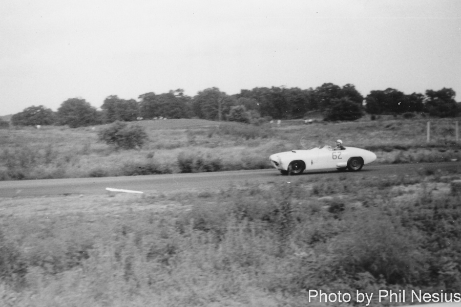 Might be Comet Number 62 driven by George Glendenning or a Ford Special (Number 49 driven by Bob Larson at other race) at Wilmot Hills 2nd Annnual relaxed Road Race, August 1, 1954 / 677L_0014 / 