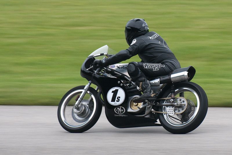 1968 Norton #1s ridden by Kenny Cummings in turn 9 at Road America, Elkhart Lake, WI
