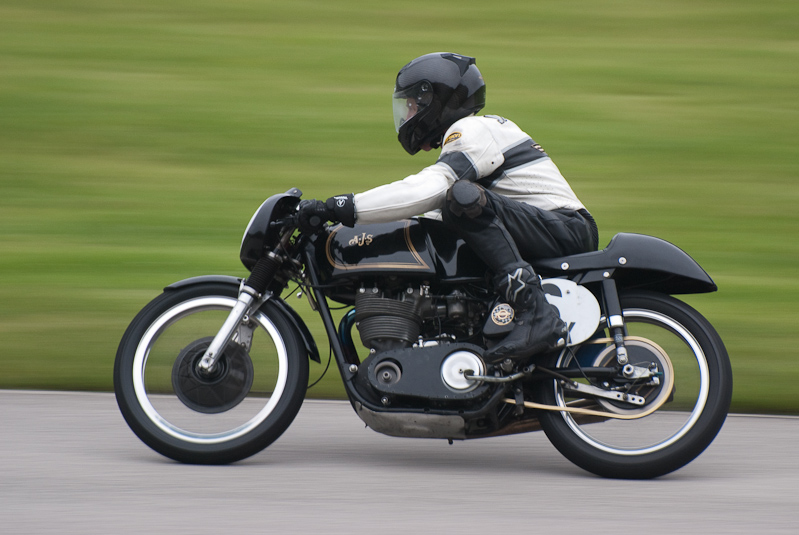 1959 AJS #6X ridden by Dave Janiec in turn 9 at Road America, Elkhart Lake, WI