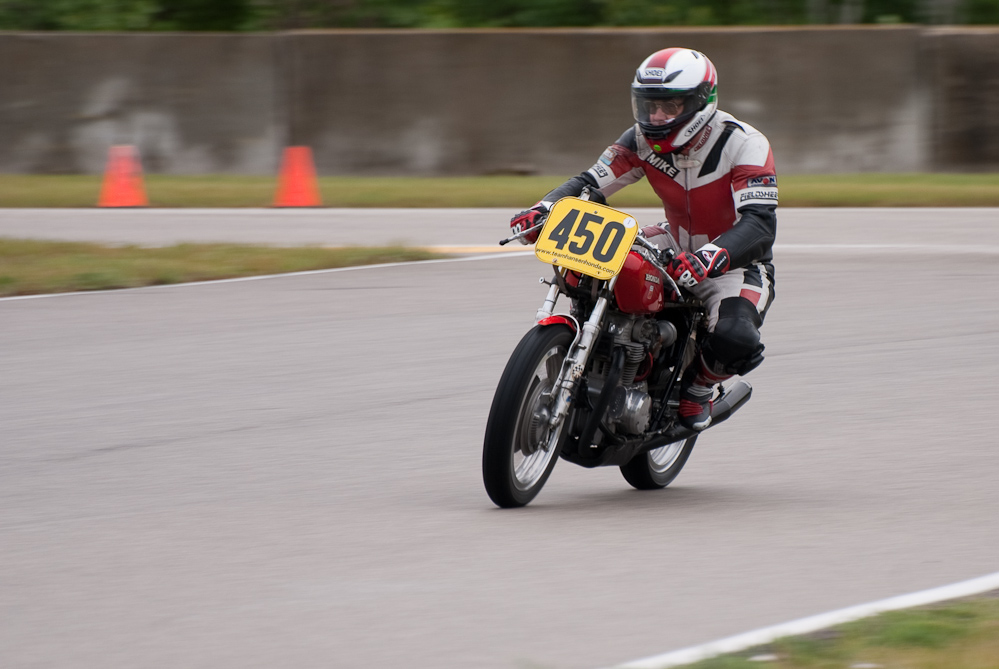 Mike Mathews on a 1971 Honda, No 450 in the bend, Road America, Elkhart Lake, WI