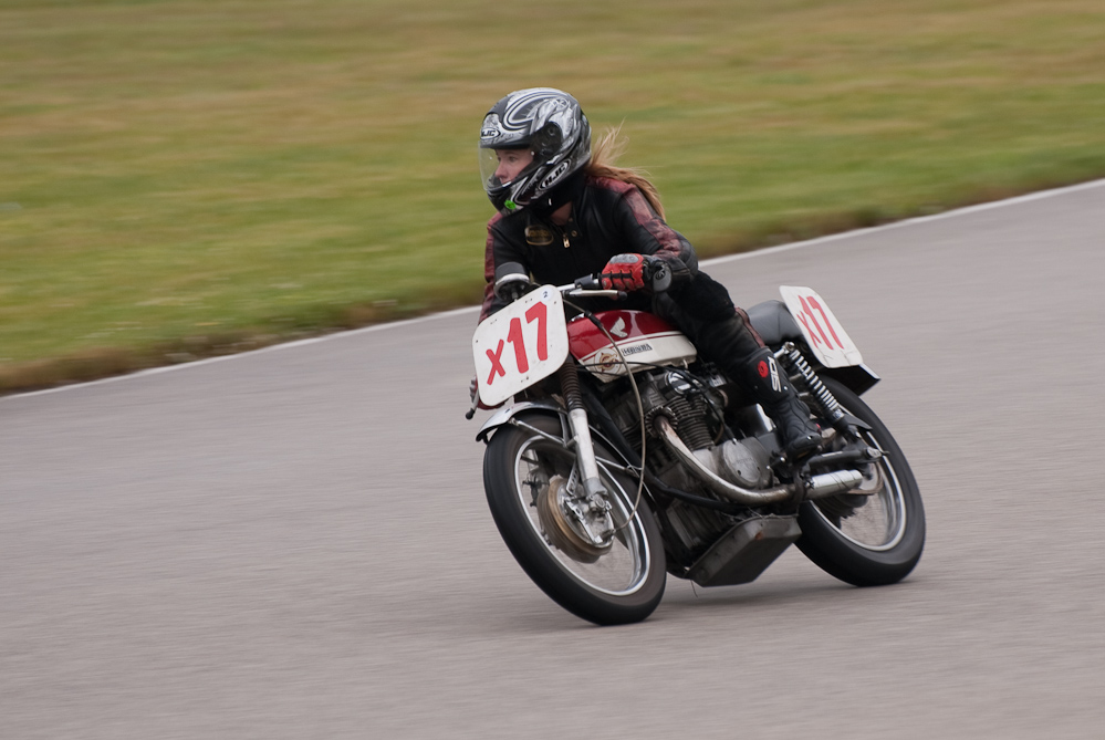 Karena Bierman on a 1970 Honda, No X17 in the bend, Road America, Elkhart Lake, WI