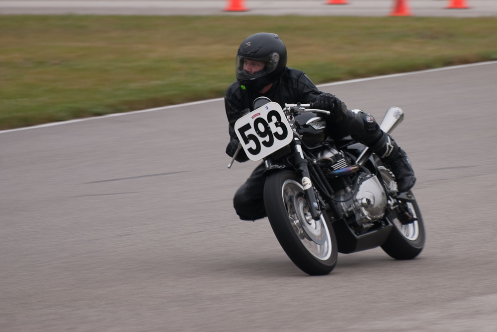 Dustin Foretich riding a 2006 Triumph, No 593 in the bend, Road America, Elkhart Lake, WI