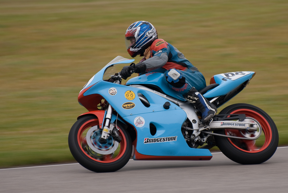 Kevin Burns riding a Suzuki, No 68 in the bend, Road America, Elkhart Lake, WI