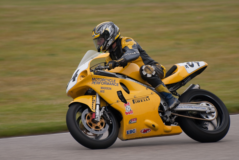 Ed Key riding a 1999 Suzuki, No R34  in the bend, Road America, Elkhart Lake, WI