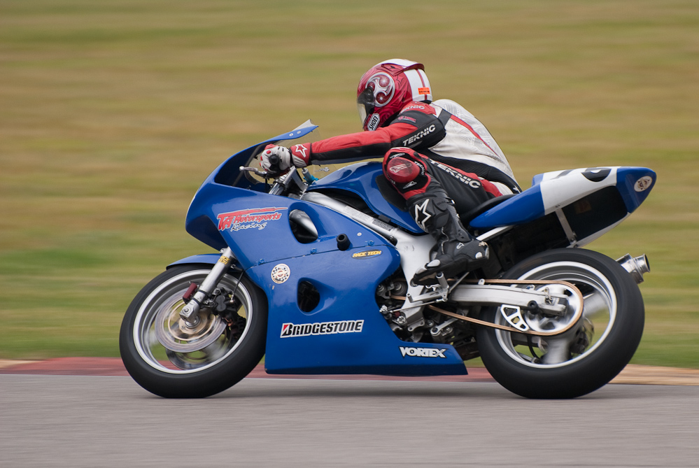 Greg Comstock riding a 2001 Suzuki, No 75 in the bend, Road America, Elkhart Lake, WI