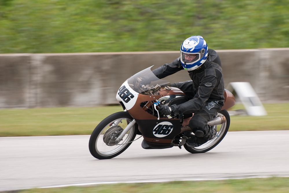 Perry Bradley on a 1966 Honda, No 466 in the bend, Road America, Elkhart Lake, WI

