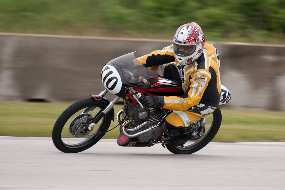 Dean Chris Steele on a 1965 Honda, No 310 in the bend, Road America, Elkhart Lake, WI