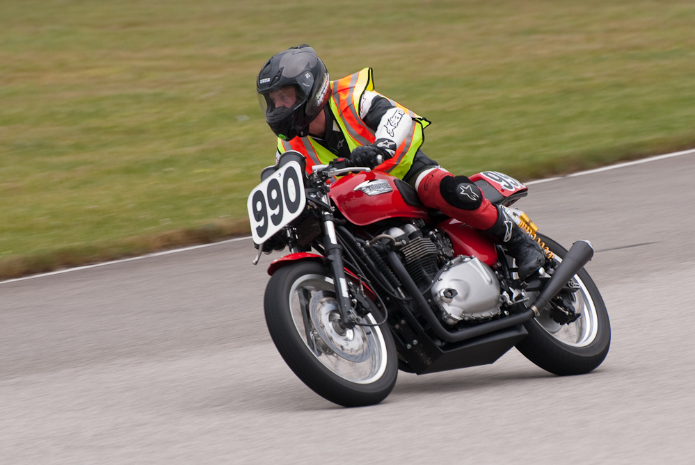 David Rhinehart on a 2008 Triumph, No 990 in the bend, Road America, Elkhart Lake, WI