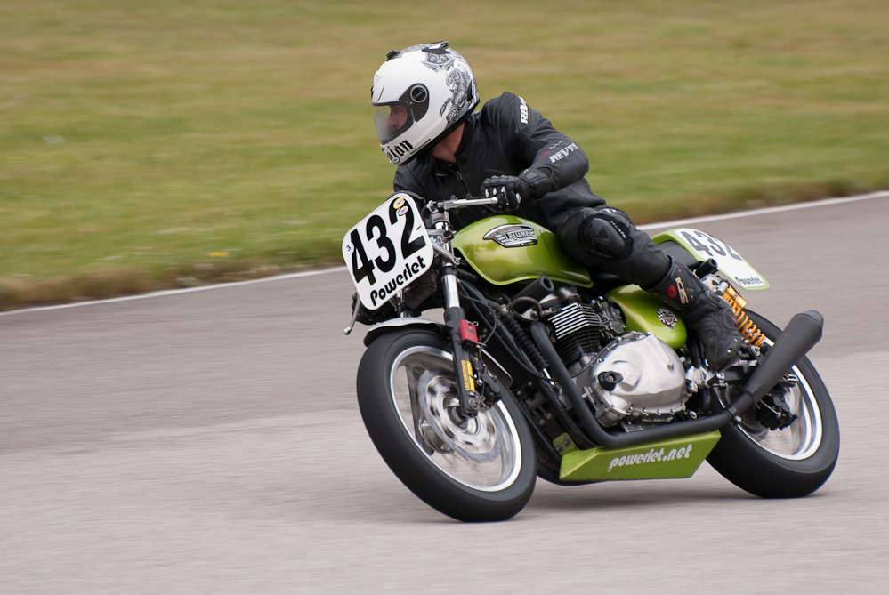 Jeffrey Bottrell riding a 2005 Triumph, No 432 in the bend, Road America, Elkhart Lake, WI