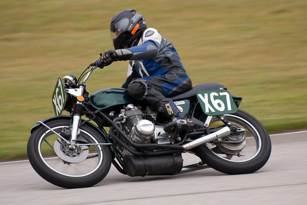 Steven Hopkins on a 1974 Honda, No X67 in the bend, Road America, Elkhart Lake, WI