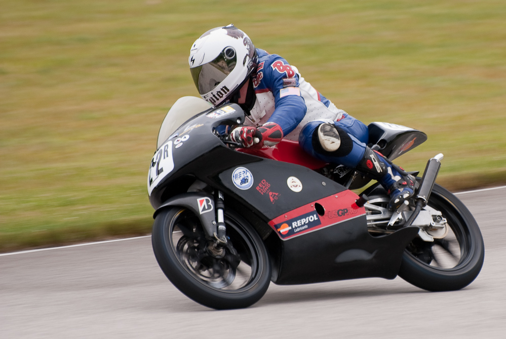 Steve Thompson riding a Honda, No 22R in the bend, Road America, Elkhart Lake, WI