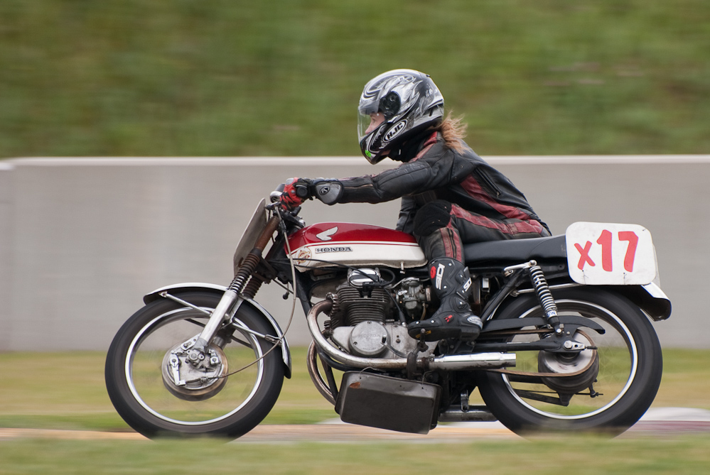 Karena Bierman on a 1970 Honda, No X17 in the bend, Road America, Elkhart Lake, WI