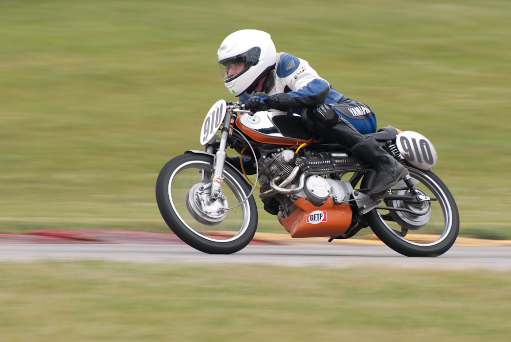 Kevin Knuth on a 1965 Honda, No 910 in turn 7, Road America, Elkhart Lake, WI