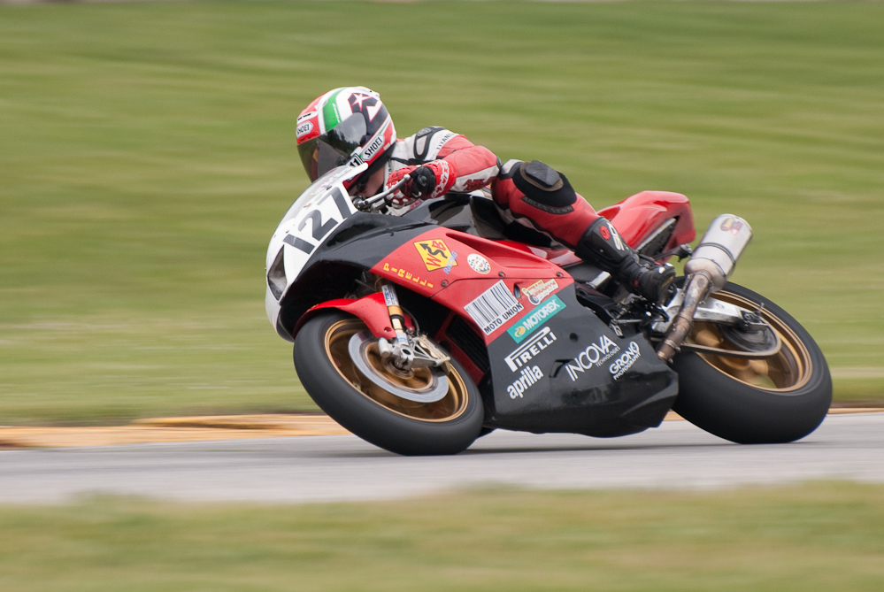 Todd Murray riding a 2004 Aprilia, No 127 in turn 7, Road America, Elkhart Lake, WI