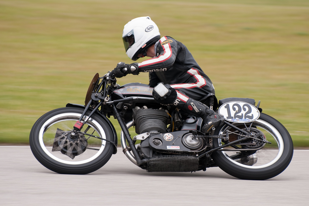 Alex Mclean riding a 1937 Norton, No 122 in the bend, Road America, Elkhart Lake, WI 