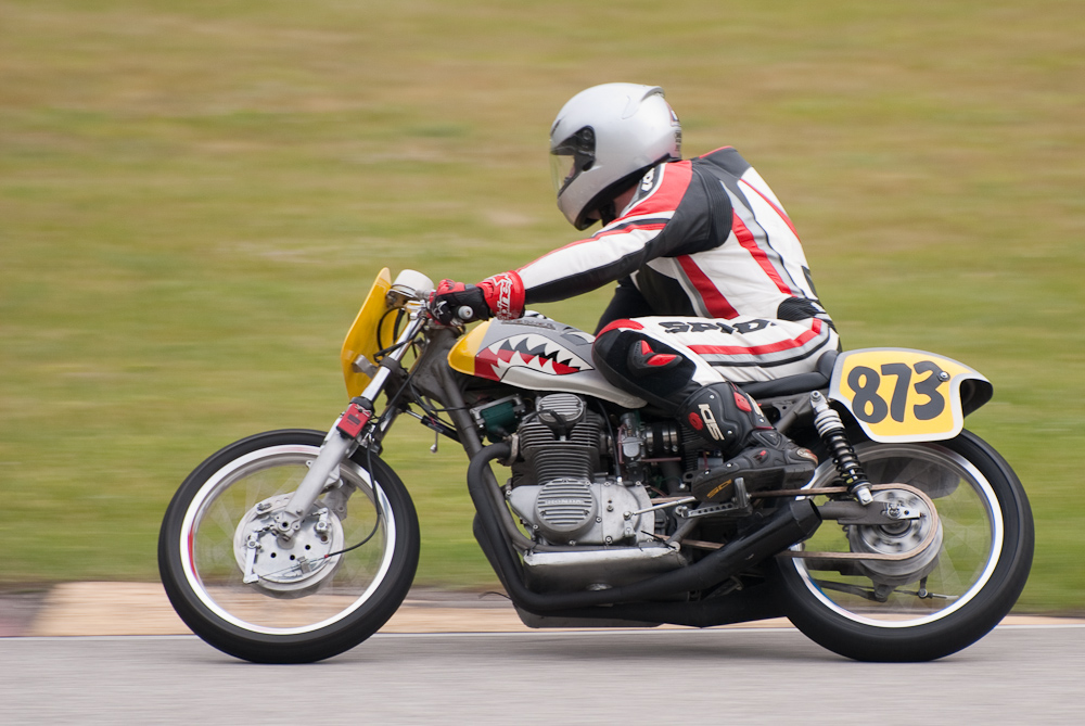 Steven Jackson riding a 1971 Honda, No 873 in the bend, Road America, Elkhart Lake, WI