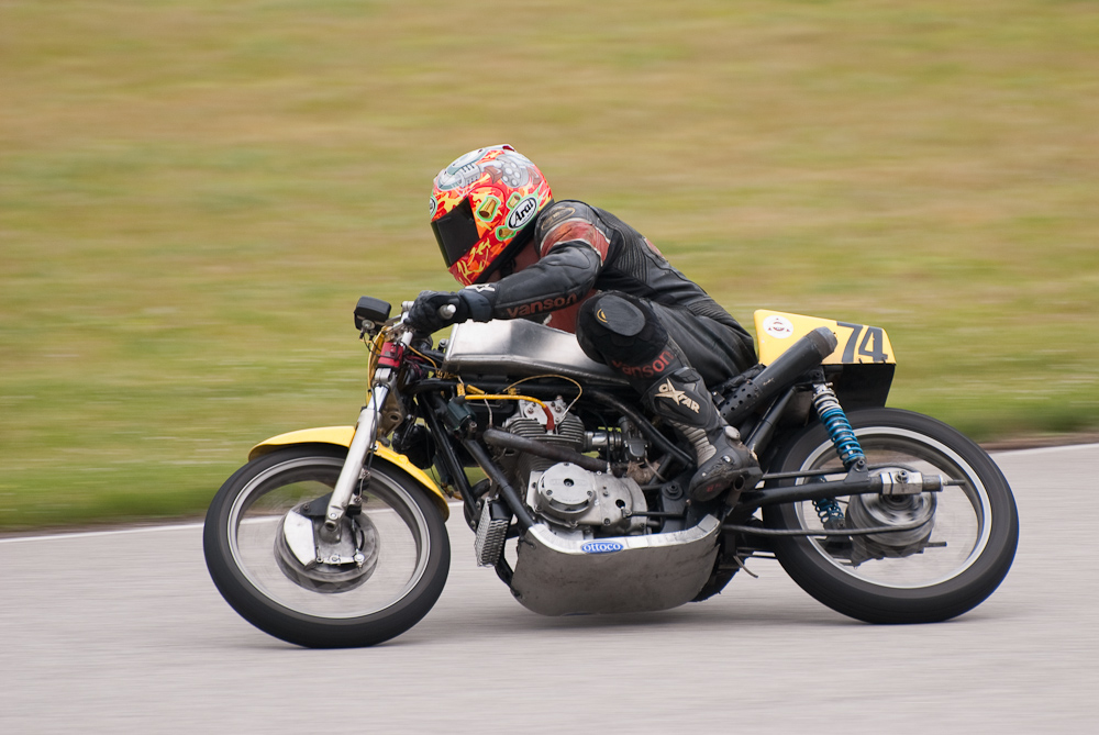 Wes Orloff riding a Honda, No 74 in the bend, Road America, Elkhart Lake, WI