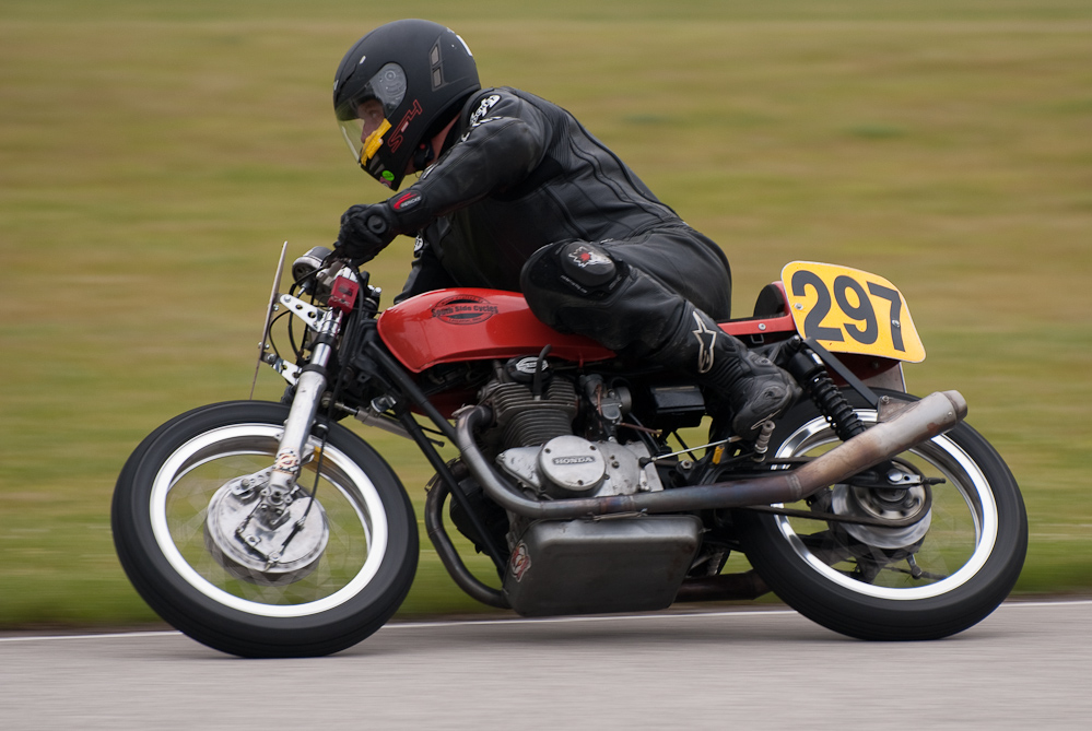 Jack Mattlin on a Honda, No 297 in the bend, Road America, Elkhart Lake, WI