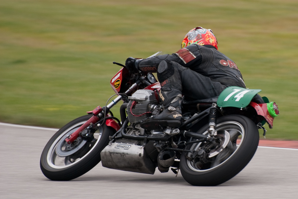 Wes Orloff riding a Moto Guzzi, No 74 in the bend, Road America, Elkhart Lake, WI