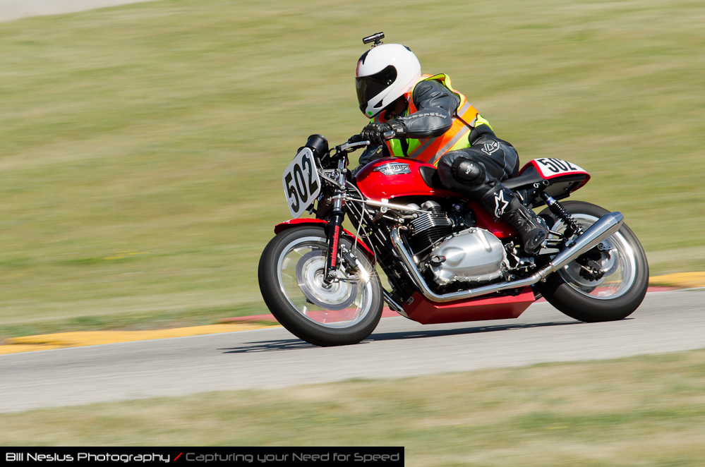 DSC_5279 / Triumph No 502 in turn 7, Road America Elkhart Lake, WI