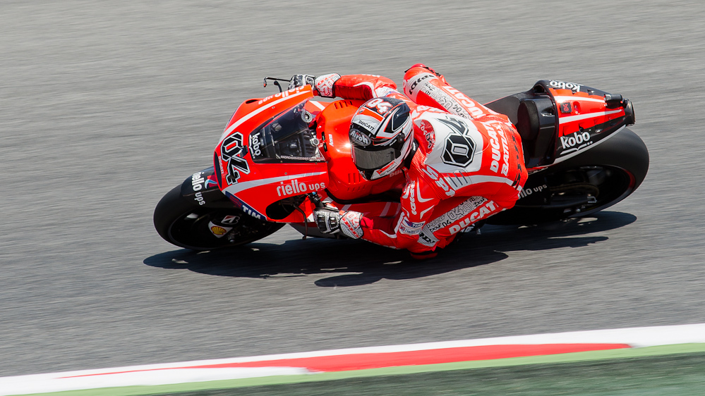 Andrea Dovizioso on the #04 GP13 Ducati Desmosedici GP13 at Circuit de Catalunya turn 7 / DSC_4510