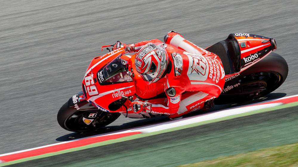 Nicky Hayden on the #69 GP13 Ducati Desmosedici GP13 at Circuit de Catalunya turn 7 / DSC_4534