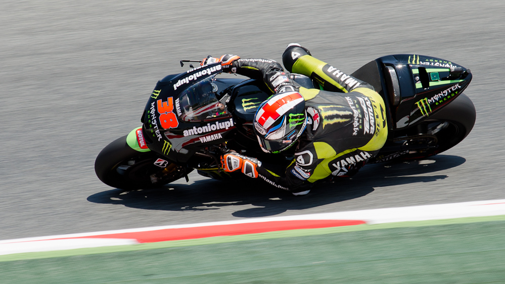 Bradley Smith on the #38 Monster Yamaha Tech 3 Yamaha M1 at Circuit de Catalunya turn 7 / DSC_4538