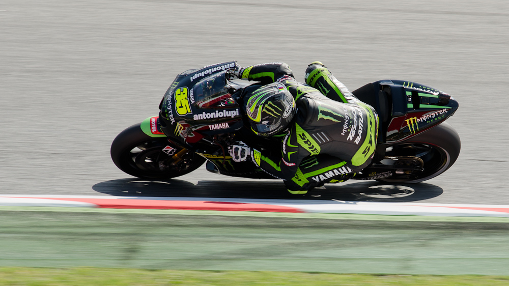 Cal Crutchlow on the #35 Monster Yamaha Tech 3 Yamaha M1 at Circuit de Catalunya turn 7 / DSC_5698