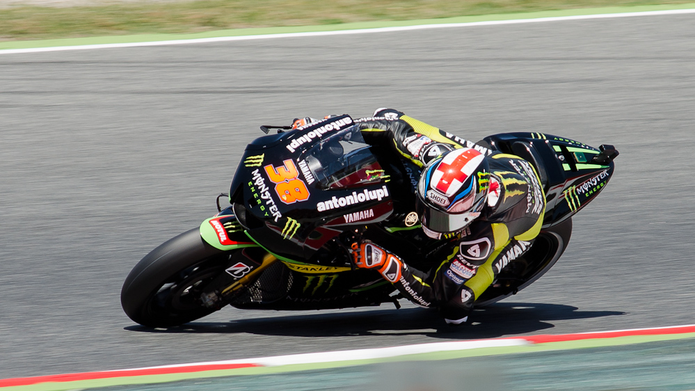 Bradley Smith on the #38 Monster Yamaha Tech 3 Yamaha M1 at Circuit de Catalunya turn 2 / DSC_6233