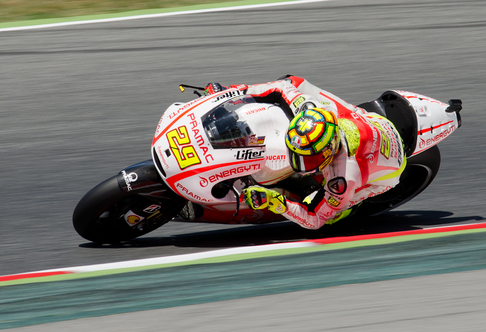 Andrea Iannone on the #29 Pramac Racing Team Ducati at Circuit de Catalunya turn  2 / DSC_6346