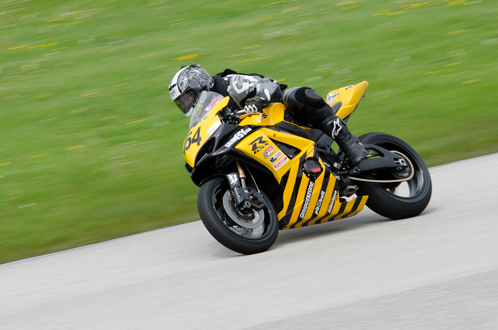 DSC_1719 / Alex Locker on the No 454 GSXR 1000 Suzuki in turn 9 Road America, Elkhart Lake, WI