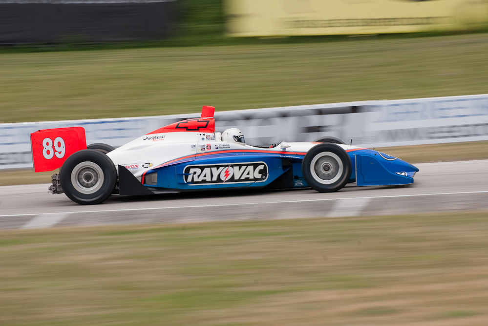 Paul Morgan driving a 2002 Dallara IRL in turn 13 Road America, Elkhart Lake, WI  ~  DSC_0539