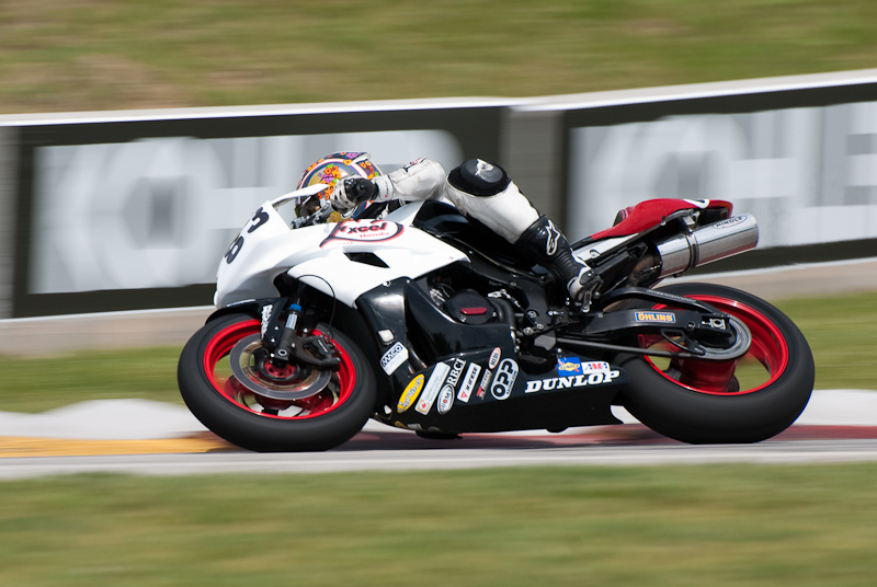 Marie-Josee Boucher, No. 83 on the Boucher Racing Honda CBR600RR in turn 7, Road America, Elkhart Lake, WI