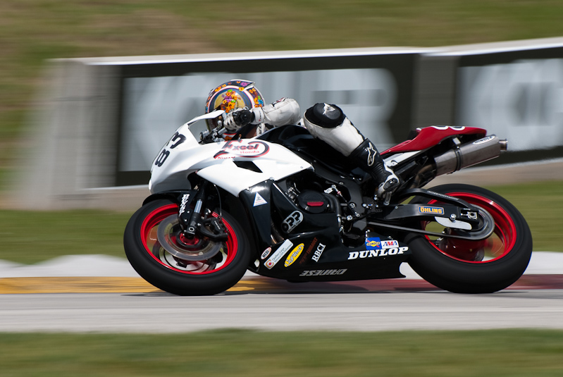 Marie-Josee Boucher, No. 83 on the Boucher Racing Honda CBR600RR in turn 7, Road America, Elkhart Lake, WI