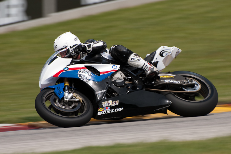 Eric Pinson, No.2 on the Blue Moon Liberty Waves BMW S1000RR in turn 7, Road America, Elkhart Lake, WI