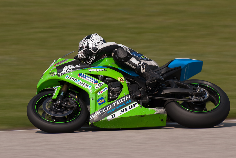 Jason Farrell on the No 86 Speed Tech Performance Kawasaki ZX-10 in the bend, Road America, Elkhart Lake, WI