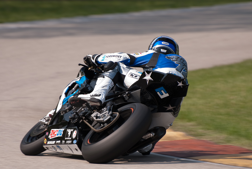Larry Pegram on the No 72 Pegram Racing BMW S1000RR in the bend, Road America, Elkhart Lake, WI