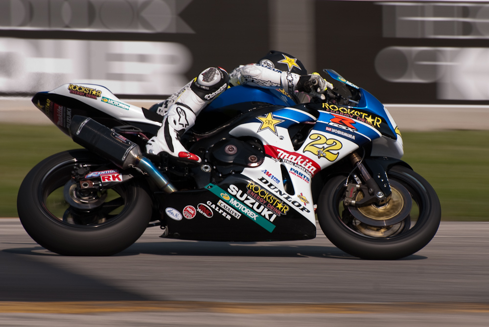 Tommy Hayden on the No 22 Rockstar ·Makita Suzuki GSX-R1000 in turn 6, Road America, Elkhart Lake, WI