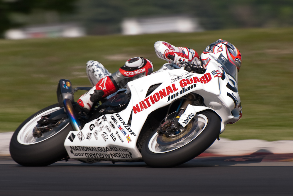 Roger Hayden on the No 54 National Guard Jordan Suzuki Suzuki GSX-R1000 in turn 6, Road America, Elkhart Lake, WI