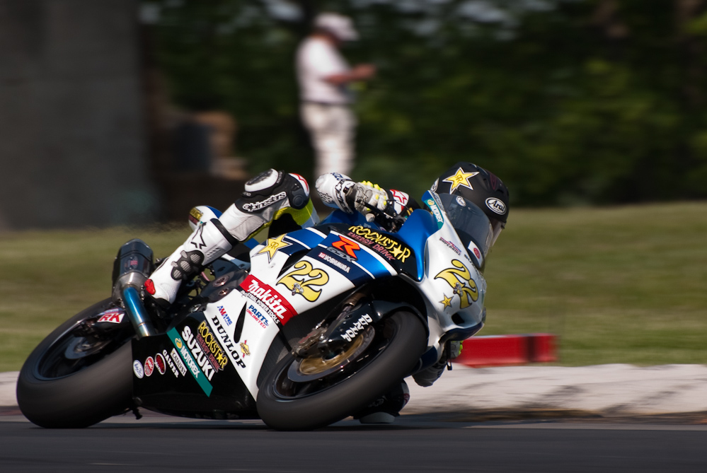 Tommy Hayden on the No 22 Rockstar ·Makita Suzuki GSX-R1000 in turn 6, Road America, Elkhart Lake, WI