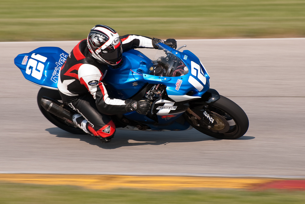 Trent Gibson on the No 12 Seven Sports Suzuki GSX-R1000 in turn 7, Road America, Elkhart Lake, WI