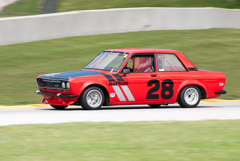 1970 Datsun 510 car# 28 driven by Don Eichelberger in turn 7 at Road America, Elkhart Lake, WI.
