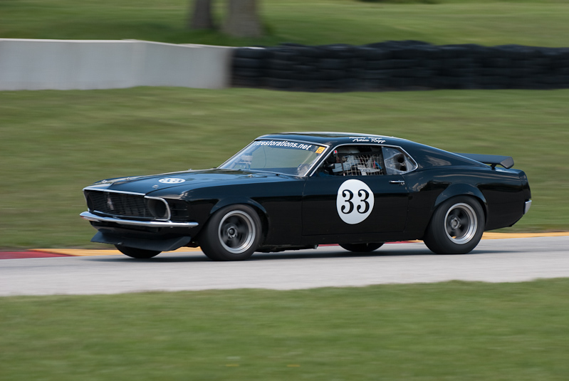 1969 Ford Boss 302 car# 33 driven by Adam Rupp in turn 7 at Road America, Elkhart Lake, WI