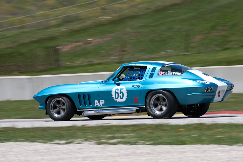 1965 Chevy Corvette car# 65 driven by Brent Jarvis in turn 7 at Road America, Elkhart Lake, WI