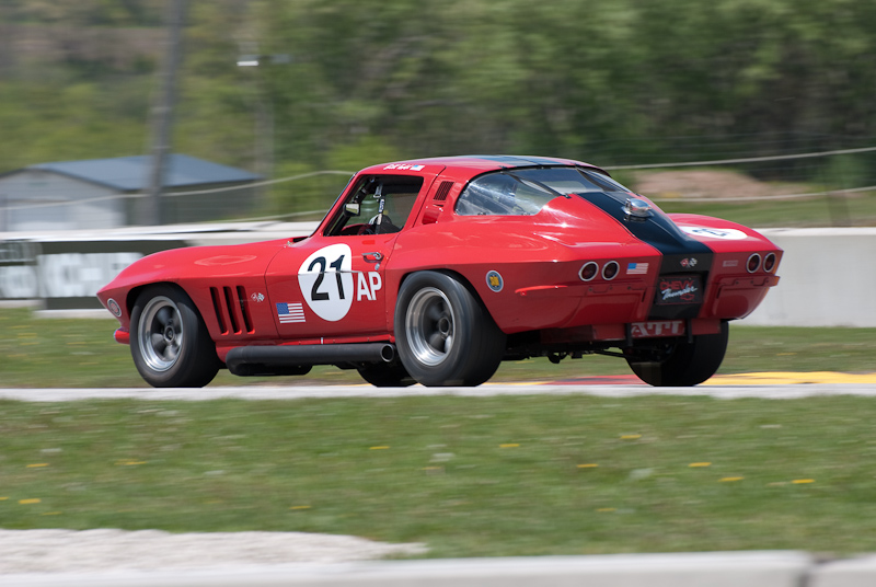 1965 Chevy Corvette car# 21 driven by Bill Todd in turn 7 at Road America, Elkhart Lake, WI